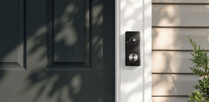 Tapo Doorbell Pro D260 mounted beside a front door
